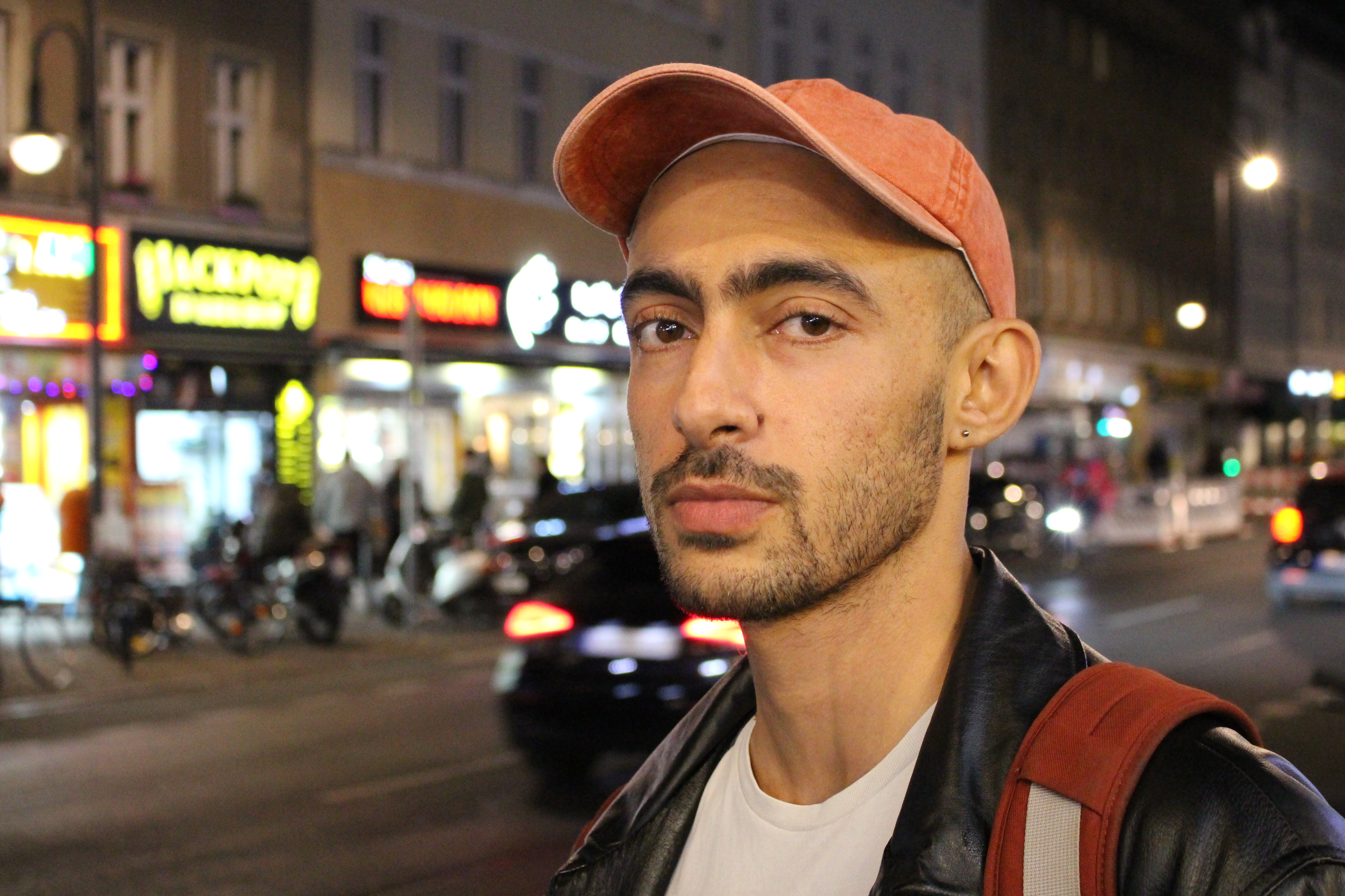 Portrait of Awadalla in urban environment